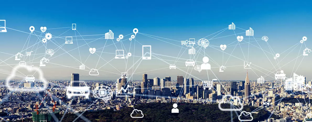 Ville moderne avec technologie connectée symbolisant nos industries